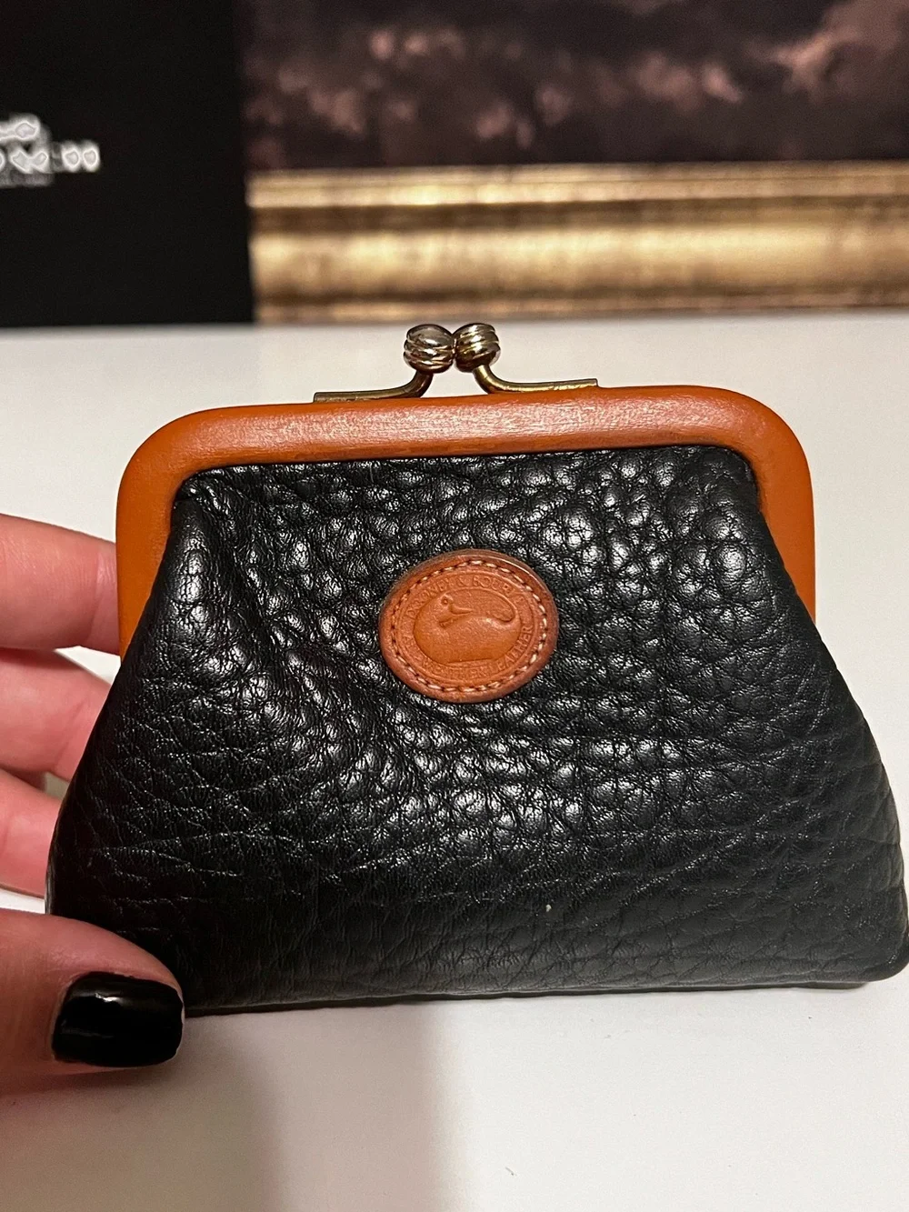 Dooney & Bourke Black Pebbled Leather Coin Purse with Tan Trim